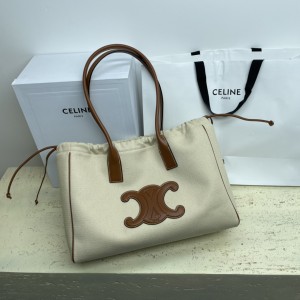 CELINE 퀴르 트리옹프 드로우스트링 카바스 백